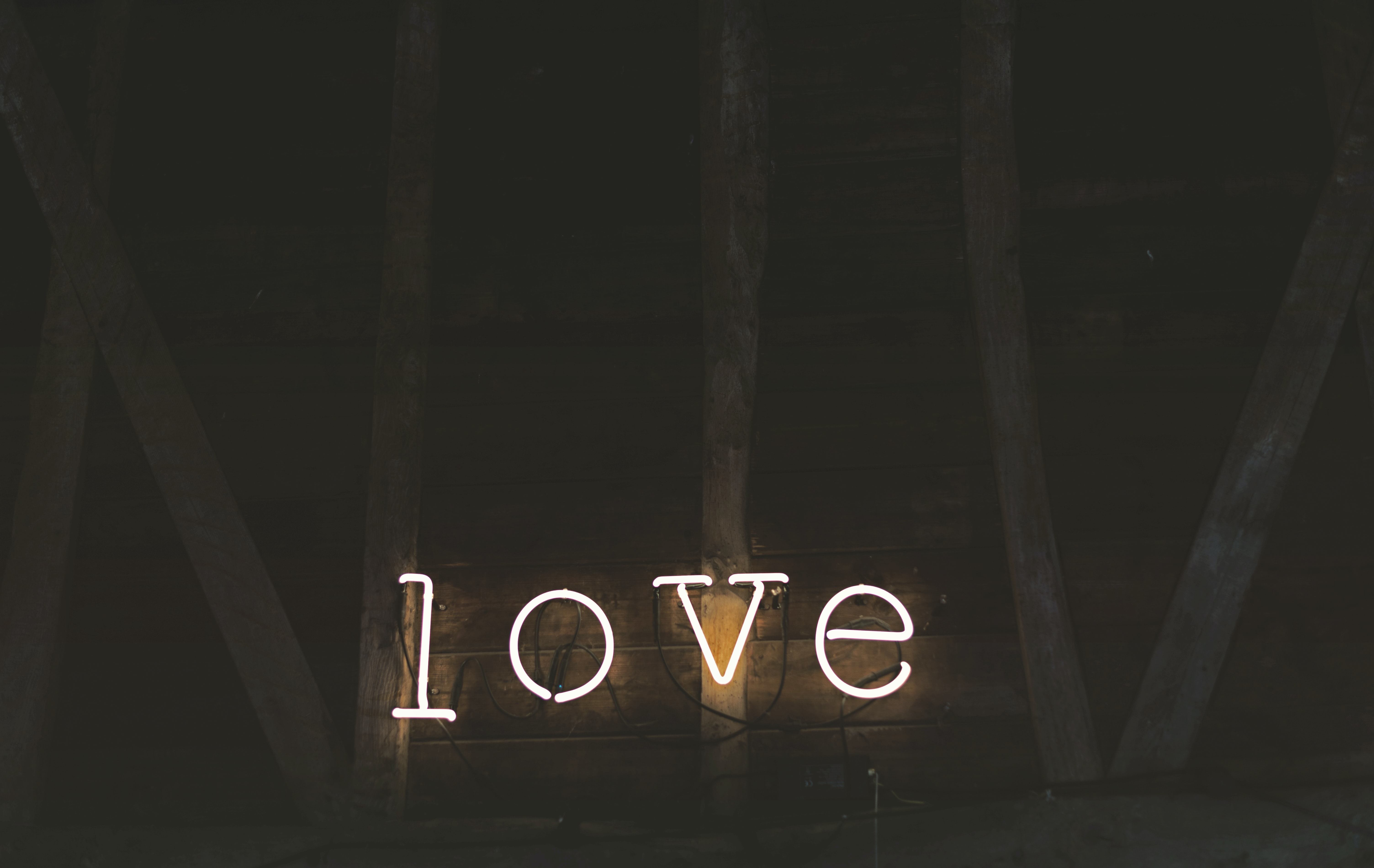 the word love illuminated in lights