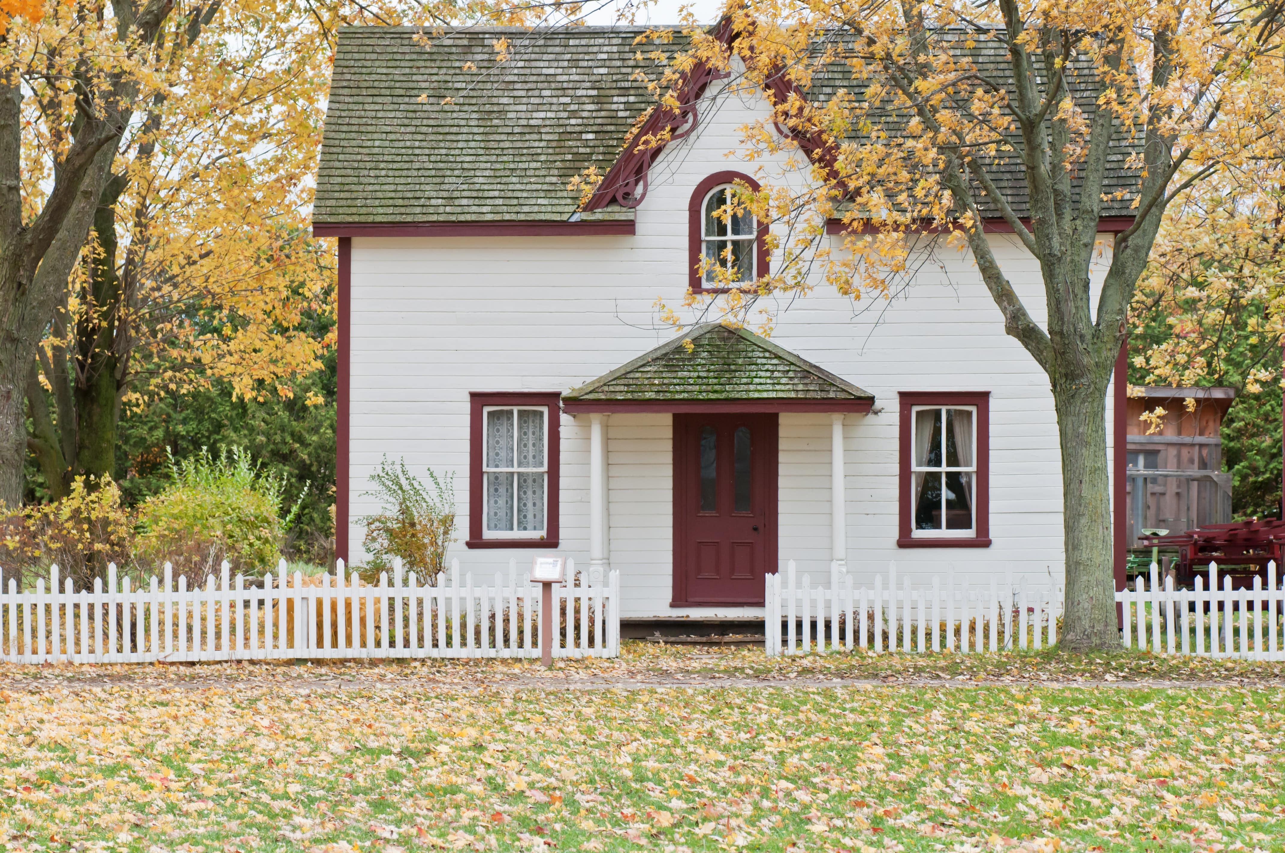 home with picket fence quintessential settling down meaning