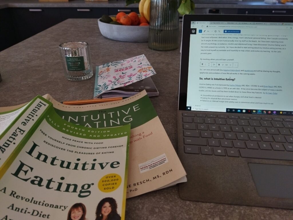 Intuitive eating book and workbook photos