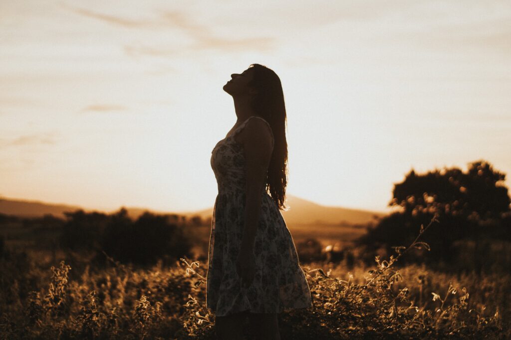 woman gazing at sky compassion