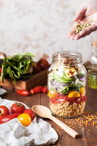 jar with salad and mixture of textures eat for satisfaction